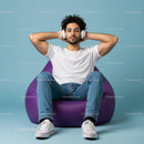 Young Man Relaxing with Headphones on Purple Bean Bag