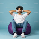 Casual Man Relaxing with Headphones on Purple Beanbag