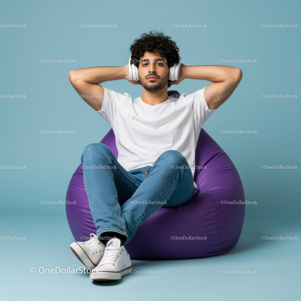 Relaxed Young Man in Casual Wear Listening to Music
