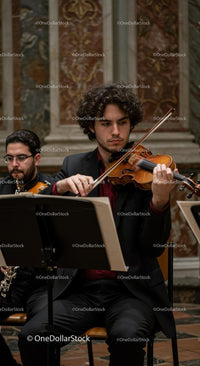 Passionate Violinist Performing in Classical Orchestra