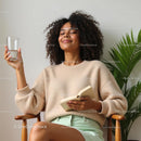 Relaxed Woman Reading in Cozy Home Setting