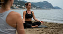 Woman Practicing Yoga on Tranquil Beach During Sunrise