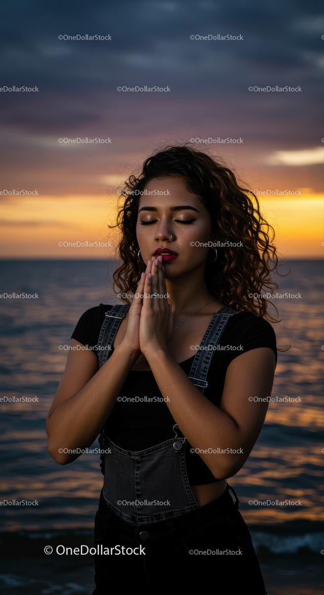 Serene Woman Meditating at Sunset by the Ocean