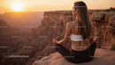 Woman Meditating at Sunset in Majestic Canyon Landscape