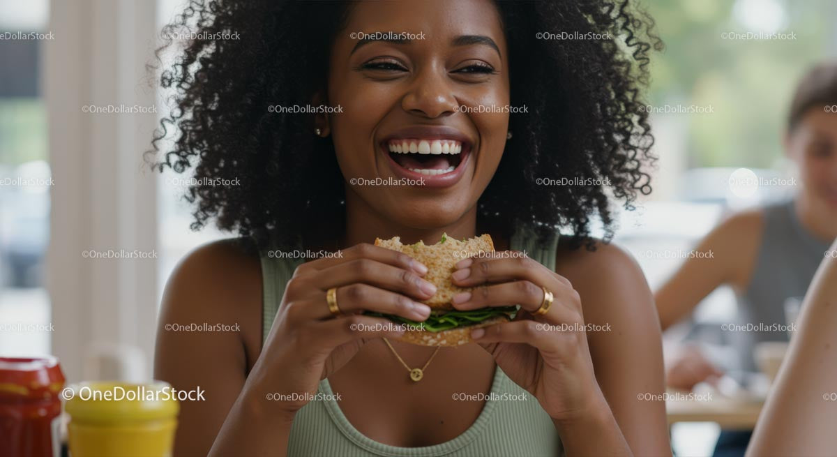Smiling Woman Enjoying a Fresh Sandwich at Lunch