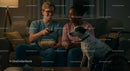 Couple Enjoying Movie Night with Dalmatian Dog