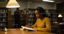 Focused Student Studying in Cozy Library Environment