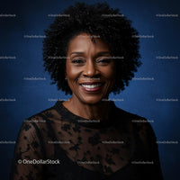 Smiling Woman in Black Lace Dress Against Blue Backdrop