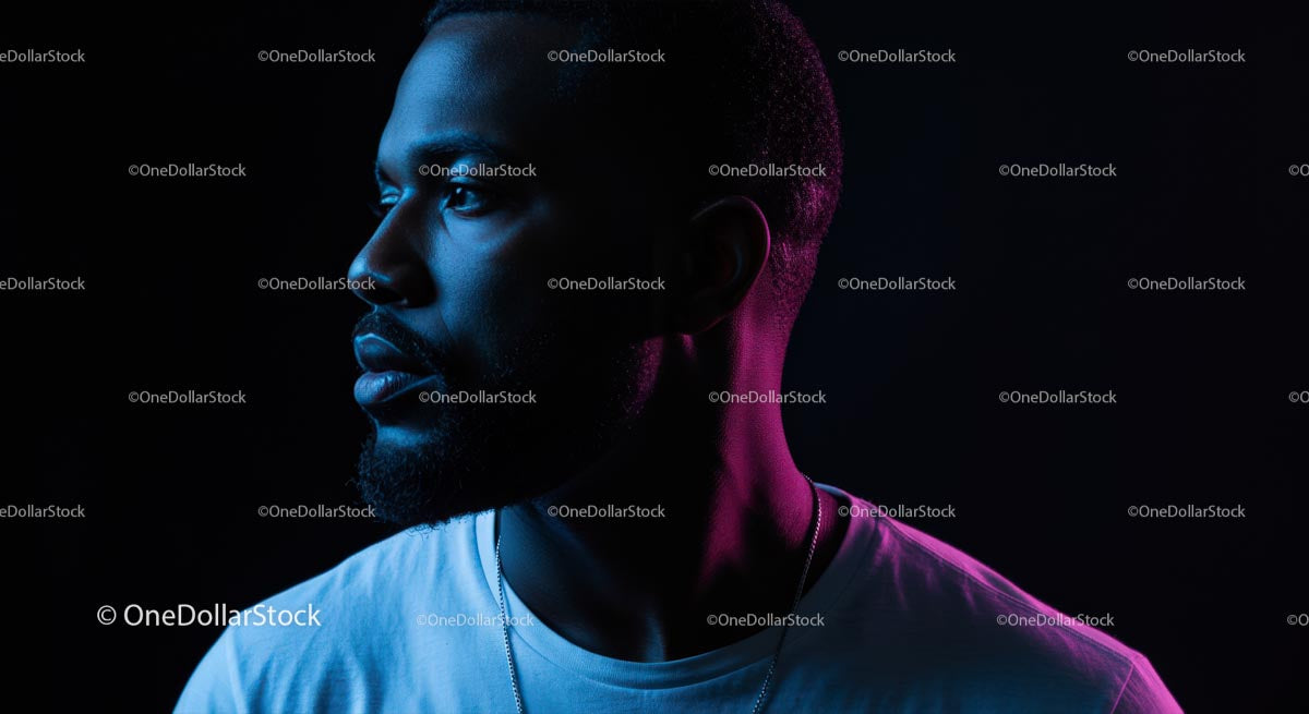 Dramatic Portrait of a Man in Neon Lighting