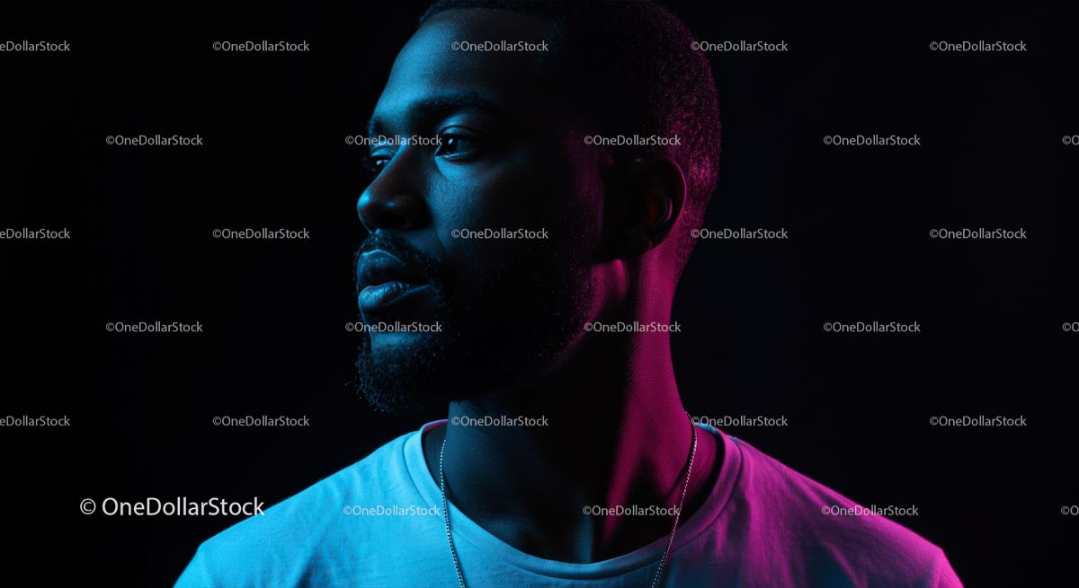 Moody Portrait of a Man in Neon Lighting