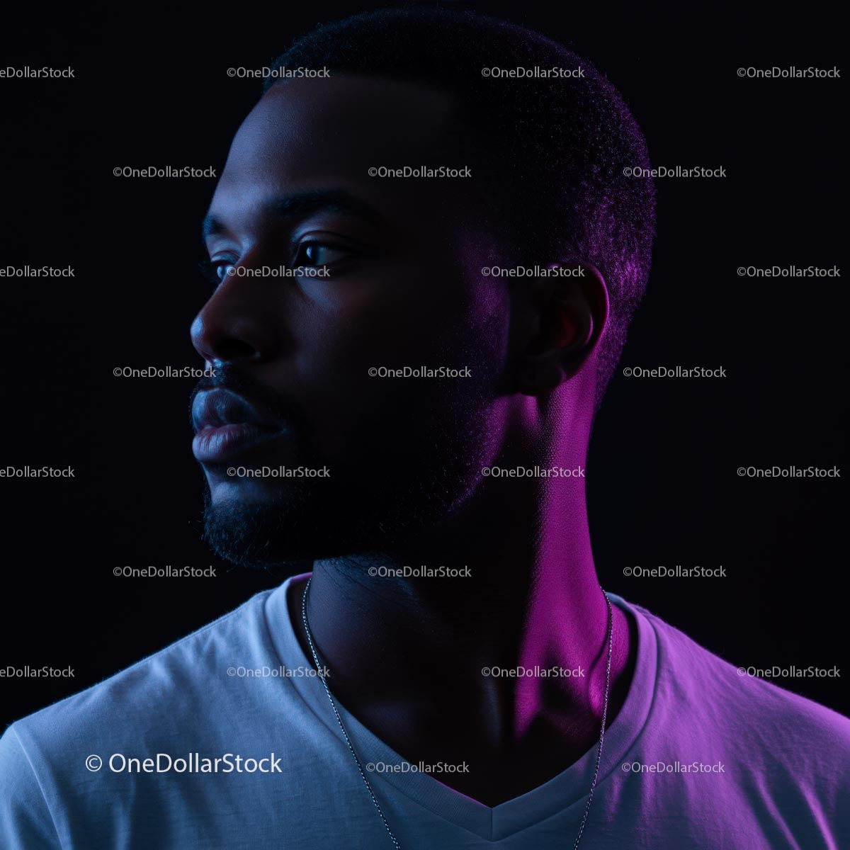 Moody Portrait of a Man in Dramatic Purple Lighting