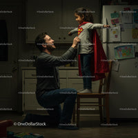 Father and Daughter Play in Superhero Costume at Home