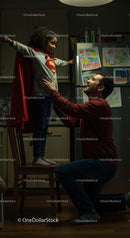 Father and Daughter Play in Superhero Costume at Home