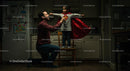 Father and Daughter Play in Superhero Costume at Home