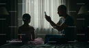Father Photographing Daughter in Pink Dress at Home
