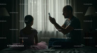 Father Photographing Daughter in Pink Dress at Home
