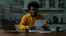 Young Man Working in Cozy Kitchen Environment