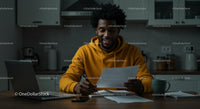 Young Man Working in Cozy Kitchen Environment