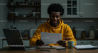 Young Man Working in Cozy Kitchen Environment