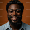 Smiling Portrait of a Man in Denim Against Brown Background