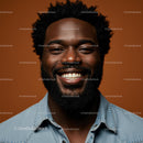 Smiling Portrait of a Man in Denim Against Brown Background