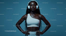 Confident Athletic Woman in Studio with Headphones