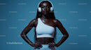 Confident Woman in Sportswear with Headphones