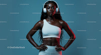 Confident Woman in Athletic Wear with Headphones