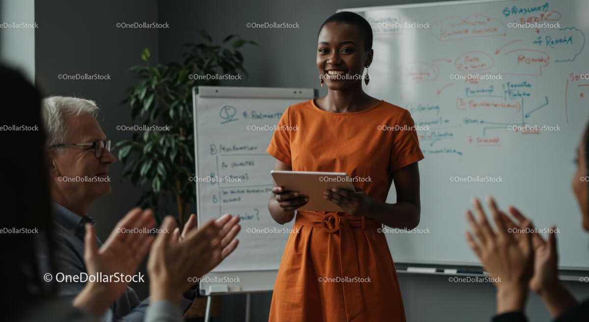 Confident Woman Giving Engaging Presentation in Orange Dress
