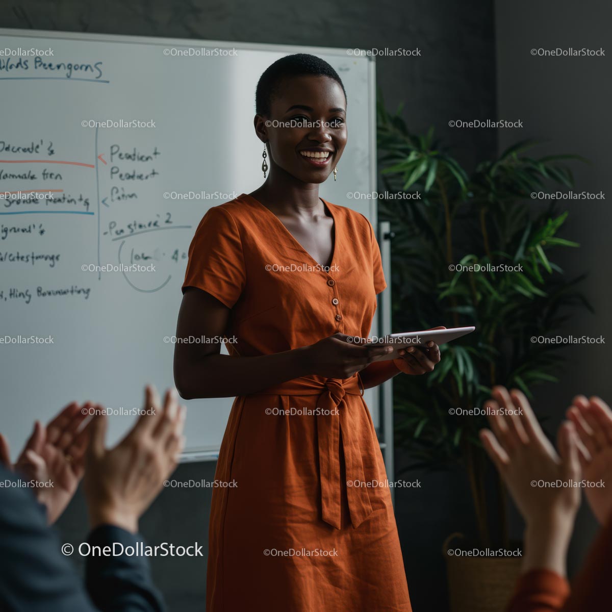 Confident Woman Giving Engaging Presentation in Orange Dress