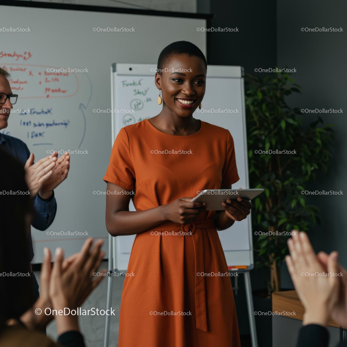 Confident Woman Giving Engaging Presentation in Orange Dress
