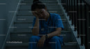 Exhausted Nurse Resting on Hospital Staircase