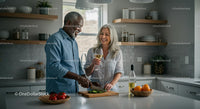Happy Couple Enjoying Cooking Together in Modern Kitchen