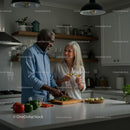 Happy Couple Enjoying Cooking Together in Modern Kitchen