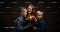 Smiling Family Portrait with Colorful Flower Bouquet