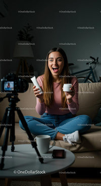 Smiling Influencer Reviewing Skincare Products at Home