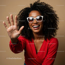 Joyful Woman in Red with Sunglasses and Curly Hair