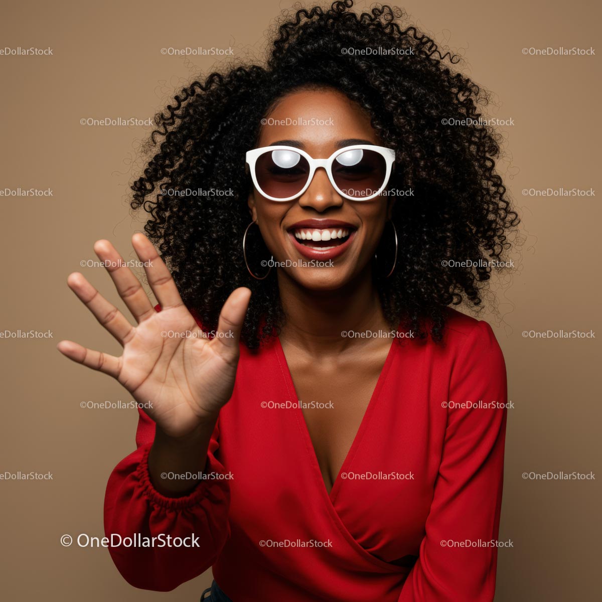 Joyful Woman in Red with Sunglasses and Curly Hair