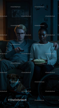 Couple Relaxing with TV and Popcorn in Cozy Living Room