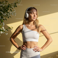 Young Woman in White Workout Outfit Enjoys Sunshine