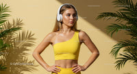 Confident Woman in Yellow Activewear with Headphones