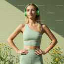 Woman in Green Activewear with Headphones Enjoying Nature