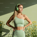 Woman in Mint Activewear and Headphones Outdoors