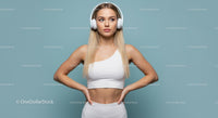 Blonde Woman in Athletic Wear with Headphones