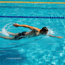 Swimmer in Freestyle Stroke at Sunny Pool