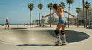 Young Woman Skateboarding at Beachside Skate Park