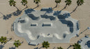 Skateboarder Enjoying Sunny Skatepark by the Beach