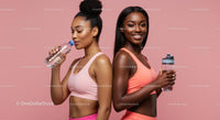 Active Women in Pink Sportswear Hydrating After Workout