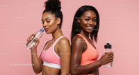 Active Women in Pink Sportswear Hydrating After Workout