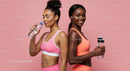 Fit Women in Stylish Sportswear Staying Hydrated